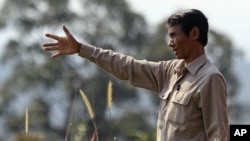 Chut Wutty, Director of the Natural Resource Protection Group, gestures at Botum Sakor National Park in Koh Kong province, Cambodia, February 2012.
