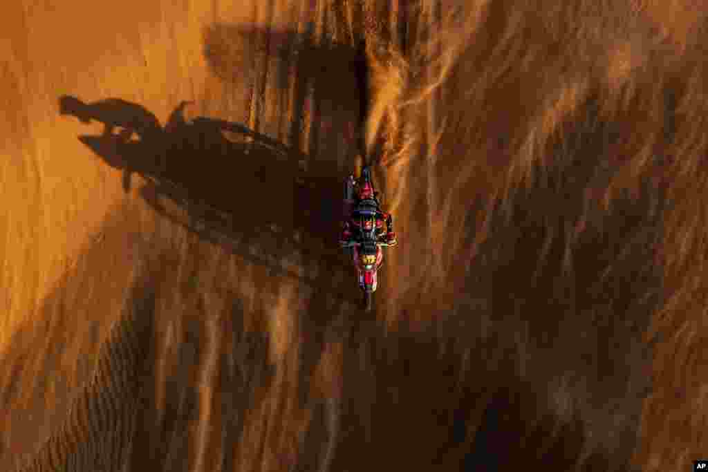 Jose Ignacio Cornejo Florino of Chile rides his Honda motorbike during stage eleven of the Dakar Rally between Shubaytah and Haradth, Saudi Arabia.