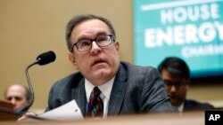 FILE - Environmental Protection Agency Administrator Andrew Wheeler testifies before the House Environment and Climate Change Subcommittee on Capitol Hill, April 9, 2019. 