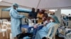 Health workers and humanitarian responders in the Democratic Republic of the Congo gather to receive a vaccination. October 16, 2026.
