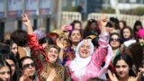 Participants dance during an International Women&#39;s Day rally in the Kurdish-dominated southeastern city of Diyarbakir, Turkey, March 8, 2017.