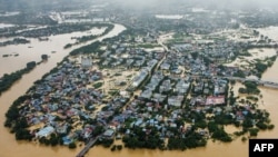 Foto dari udara tampak jalan-jalan yang terendam banjir dan gedung-gedung di Thai Nguyen, beberapa hari setelah Topan Super Yagi melanda bagian utara Vietnam, Selasa, 10 September 2024. (Foto: Xuan Quang/AFP)