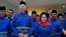 FILE - Former Malaysian Prime Minister Najib Razak, second left in front, and his wife Rosmah Mansor prepare to leave for an election nomination center in Pekan, Pahang state, Malaysia, April 28, 2018. 