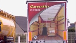 The family-owned Carpentier trucking business in Calais counts on Britain for 20 percent of its transport revenues. (L. Bryant/VOA)