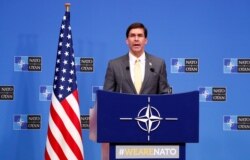 U.S. Secretary of Defence Mark Esper speaks at a news conference following a NATO defense ministers meeting at the alliance's headquarters in Brussels, Belgium, Feb. 13, 2020.