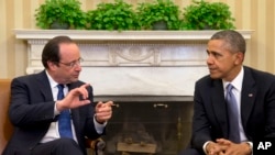 Prezidan François Hollande pandan yon rankont ak Prezidan Barack Obama nan Biwo Oval La Mezon Blanch la. (Foto: 11 fevriye 2014).