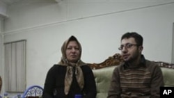 Iranian Sakineh Mohammadi Ashtiani, left, who has been sentenced to death by stoning for adultery, meets with her son, Sajjad, in the northwestern city of Tabriz, Iran, Saturday, Jan. 1, 2011. Ashtiani's sentence of death by stoning, which Iran has put on