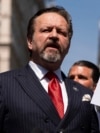 FILE - Sebastian Gorka, left, speaks during a press conference outside Manhattan criminal court on May 21, 2024, in New York. Gorka, now a senior U.S. counterterrorism official, said on Feb. 11, 2025, that the threat from jihadists is growing.