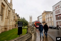 FILE - An exterior of Oxford University in Oxford, England. Some Chinese students say they are thinking about studying at British universities over those in America. (AP Photo/Caroline Spiezio, File)