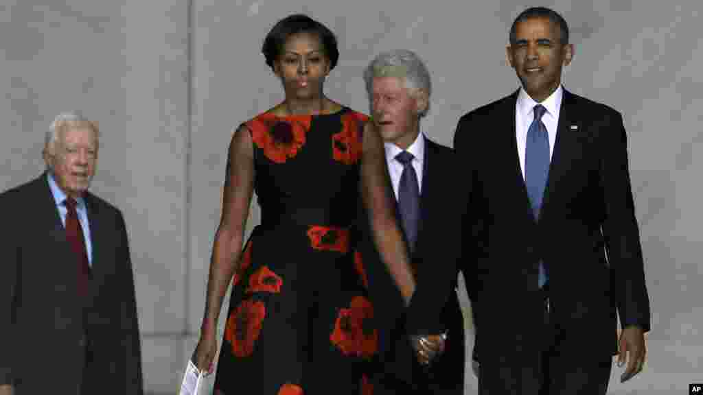 President Barack Obama, first lady Michelle Obama, former president Bill Clinton and former president Jimmy Carter arrive at the Let Freedom Ring ceremony at the Lincoln Memorial, Aug. 28, 2013, to commemorate the 50th anniversary of the 1963 March on Washington.