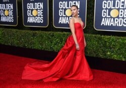 FILE - Scarlett Johansson arrives at the 77th annual Golden Globe Awards at the Beverly Hilton Hotel in Beverly Hills, Calif., Jan. 5, 2020.