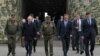 Russia's President Vladimir Putin (2nd L), Chief of the General Staff, Valery Gerasimov (R), and Defense Minister Sergei Shoigu (3rd L) attend the main stage of the Zapad 2021. (Mikhail Klimentyev/Russian Presidential Press and Information Office/TASS)