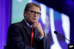 FILE - Energy Secretary Rick Perry speaks at the California GOP fall convention in Indian Wells, Calif., Sept. 6, 2019.