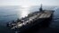 In this Nov. 12, 2011 photo provided by the U.S. Navy, the Nimitz-class aircraft carrier USS John C. Stennis (CVN 74) transits the Straits of Hormuz.