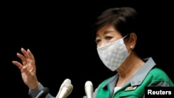 Tokyo Governor Yuriko Koike gestures as she attends a news conference in Tokyo, Japan, July 10, 2020.