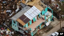 This photo provided by the Royal Navy and taken Sept. 24, 2017 shows the devastation left by Hurricane Irma in Jost Van Dyke, British Virgin Islands.