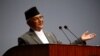 Perdana Menteri Khadga Prasad Oli. Pemerintah Nepal, Kamis (4/3), menandatangani perjanjian damai dengan kelompok kecil pemberontak komunis yang sangat ditakuti. (Foto: Reuters/Navesh Chitrakar)