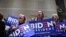 Supporters of Democratic presidential hopeful former Vice President Joe Biden cheers as he speaks at the National Constitution Center in Philadelphia, on March 10, 2020. 