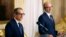 Italy's Economy Minister Giovanni Tria, left, holds a joint news conference with European Economic Commissioner Pierre Moscovici at the Treasury ministry in Rome, Oct. 18, 2018. 