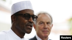 Shugaban kasar Najeriya mai jiran gado Muhammadu Buhari, yayi Magana da ‘Yan Jarida Alokacin ziyarar tsohon Faras MInistan Birtaniya Tony Blair A Abuja, Nigeriya, Mayu 13, 2015. 