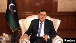 Libya’s internationally recognized Prime Minister Fayez al-Serraj is seen during an interview with Reuters at his office in Tripoli, Libya, June 16, 2019.