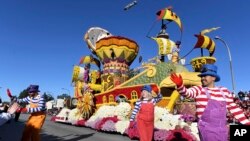 Trader Joe's company float, which won the Crown City Innovator Award, proceeds down the route during the 130th Rose Parade in Pasadena, Calif., Tuesday, Jan. 1, 2019. 
