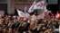 Members of the Tunisian General Labour Union mark International Workers' Day, Tunis, May 1, 2012.