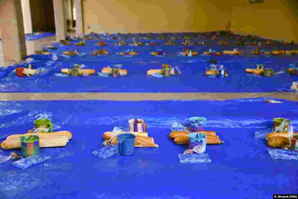 Ndogou meals lined up awaiting the sunset, May 25, 2108, at a mosque in Dakar, Senegal.