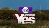 Placards showing "Yes" and "No" are displayed on moorland on the Isle of Lewis, in the Outer Hebrides of Scotland, Sept. 14, 2014. 
