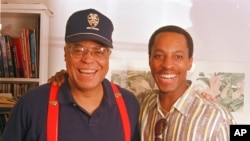 Stage actor James Earl Jones, left, is joined by baseball player Willie Randolph of the New York Yankees backstage at the 46th Street Theatre in New York City, July 24, 1987. Jones was starring in the Broadway play "Fences."