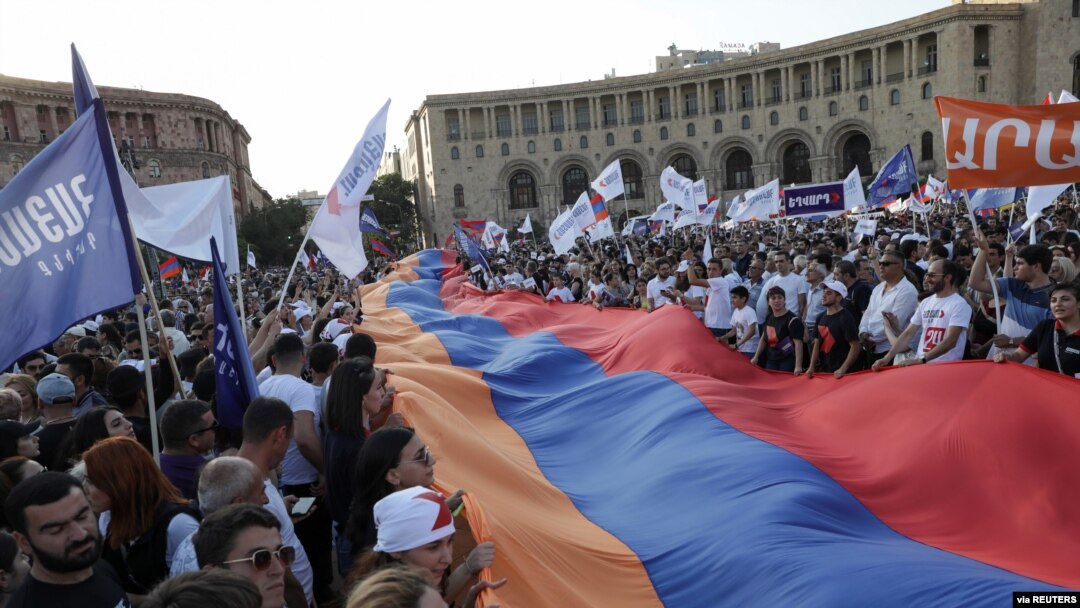 Supporters of a bloc led by the country's former president, Robert Kocharyan, attend a campaign rally ahead of the upcoming snap parliamentary election in Yerevan, Armenia, June 18, 2021. 