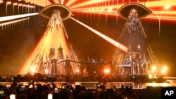 Neil Tennant, left, and Chris Lowe from the Pet Shop Boys perform alongside the Manchester Camerata during the MTV European Music Awards in Manchester, England, Nov. 10, 2024. (Scott A. Garfitt/Invision/AP)