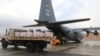 A picture released on Nov. 26, 2024, by the Jordanian Armed Forces website shows what it said was aid to be loaded into a plane destined for Gaza, in Zarqa, Jordan.