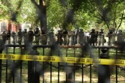 DC National Guard Military Police officers stand guard behind a fence surrounding Lafayette Park outside the White House as protests continue over the death in police custody of George Floyd, in Washington, June 2, 2020.