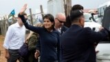 US Ambassador to the UN, Nikki Haley waves towards Internally Displaced People (IDP) while being evacuated by her protection force following a demonstration in Juba, South Sudan, on October 25, 2017. 