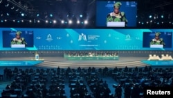 FILE - Director-General of the World Trade Organization Ngozi Okonjo-Iweala speaks during the opening ceremony of the WTO ministerial meeting in Abu Dhabi, United Arab Emirates, February 26, 2024.