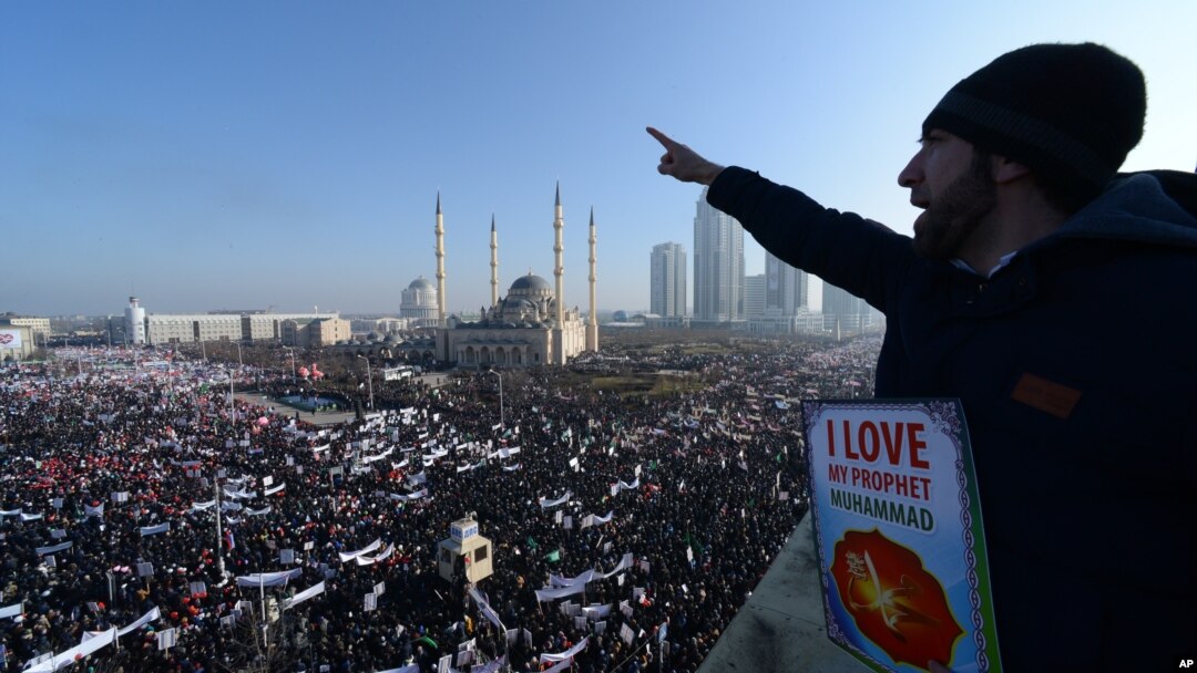 Chechen Muslims gather in downtown regional capital of Grozny to take part in a protest rally against the French satirical weekly Charlie Hebdo, Jan. 19, 2015.