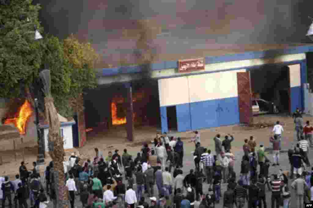 Egyptian anti-government protesters set fire to a fire station in Suez, Egypt Thursday, Jan. 27, 2011. Egyptian activists protested for a third day as social networking sites called for a mass rally in the capital Cairo after Friday prayers, keeping up th