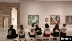 Students protest inside Picasso Museum in Barcelona, Spain May 27, 2021. Picture taken May 27, 2021 in this picture obtained from social media. (Ismael Llopis/via REUTERS)