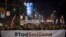 Protesters hold a banner reading '1 out of 5 million' during a demonstration against President Aleksandar Vucic, in Belgrade, Serbia, Feb. 9, 2019.