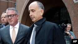 California businessman Stephen Semprevivo departs federal court, May 7, 2019, in Boston, after pleading guilty to charges that he bribed the Georgetown tennis coach to get his son admitted to the school.