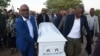 Members of the Cabinet of Botswana carry the coffin of the late Pitseng Gaoberekwe during a funeral and memorial service in Metsiamanong village, Central Kalahari Game Reserve (CKGR), on Dec. 10, 2024.