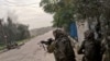 Israeli soldiers operate in a location given as Khan Younis