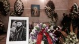 People mourn translator Andrei Mironov, 60, who was killed along with Italian photographer Andrea Rocchelli during fighting in eastern Ukraine, at a memorial service in Moscow.&nbsp; One of the last political prisoners to be held during the Soviet era, Mironov dedicated the rest of his life to exposing human rights abuses.