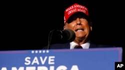 FILE - Former President Donald Trump addresses the crowd at the beginning of an election rally in Latrobe, Pa. Saturday, Nov. 5, 2022.