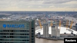 FILE - A Barclays bank building is seen at Canary Wharf in London, Britain, Oct. 19, 2016. 