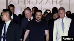 Президент Украины Владимир Зеленский прибыл в Сингапур на конференцию «Диалог Шангри-Ла». 1 июня 2024г. REUTERS/Edgar Su.