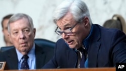 Senator Sheldon Whitehouse, a Democrat from Rhode Island, speaks as Senator Dick Durbin, an Illinois Democrat, listens during a confirmation hearing for Kash Patel, at the Capitol in Washington, Jan. 30, 2025.