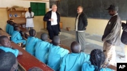 FILE - A Catholic primary school holds classes in Tchere, Cameroon, April 5, 2014. 