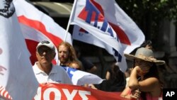 Civil servants continues a second day of work stoppages and held a protest rally in central Athens, Greece, Aug. 2, 2013. 